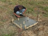 KC8JEV signing the tower base.